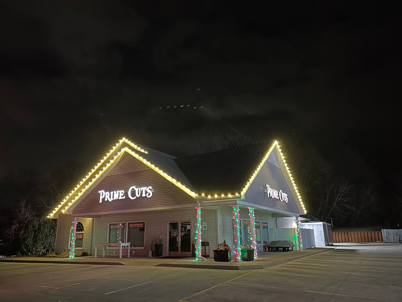 Professional Christmas light installation on a commercial property